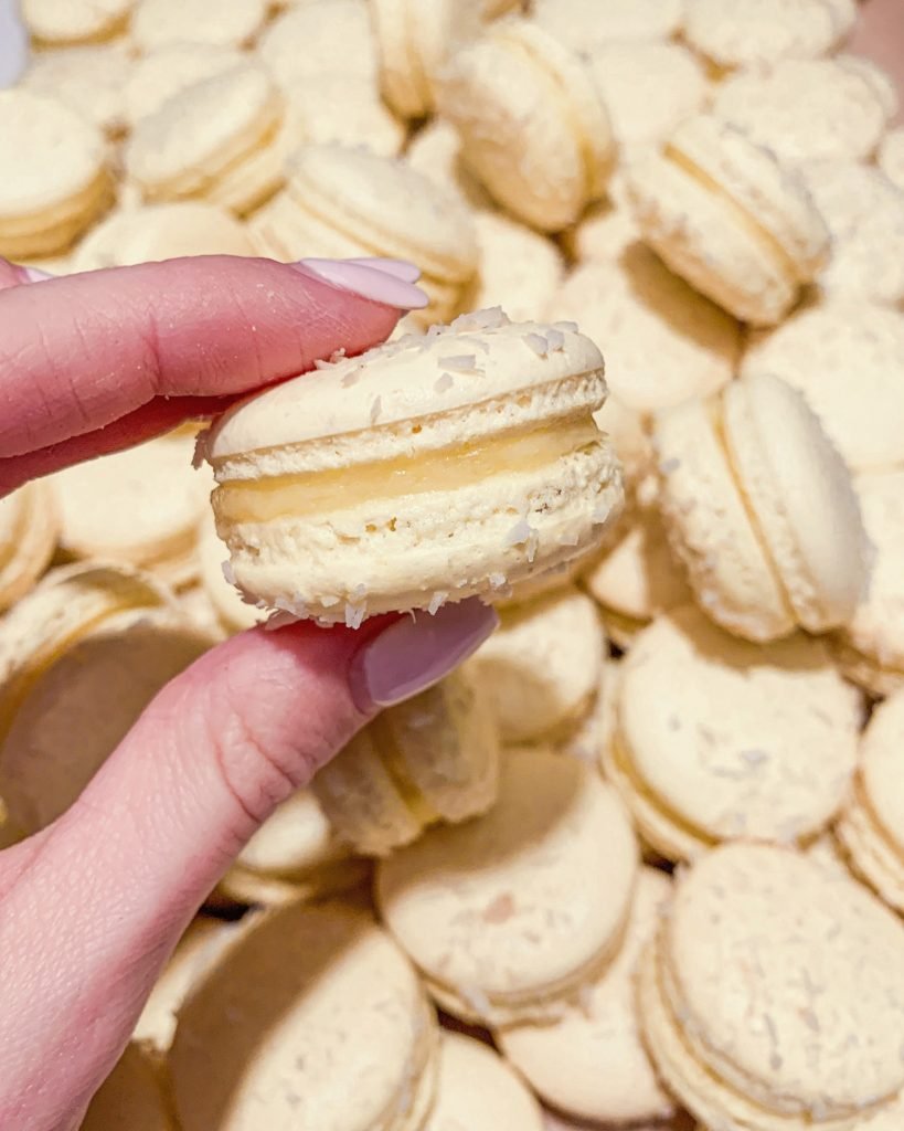 Yellow pina colada macarons coconut flakes