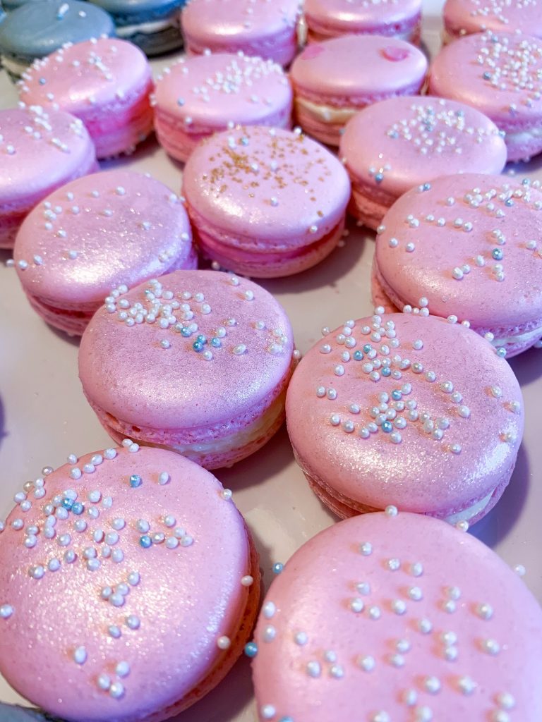 Shiny sparkling light pink macarons
