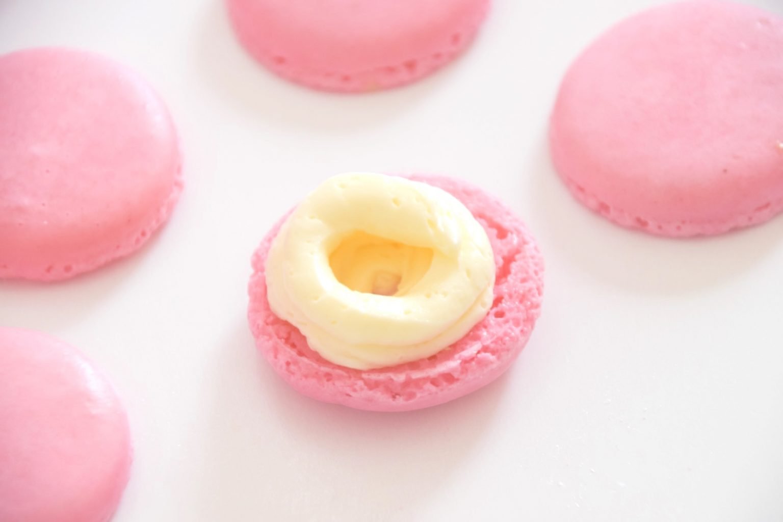 Raspberry Vanilla Macarons (with Fresh Raspberries) - Baking with Belli