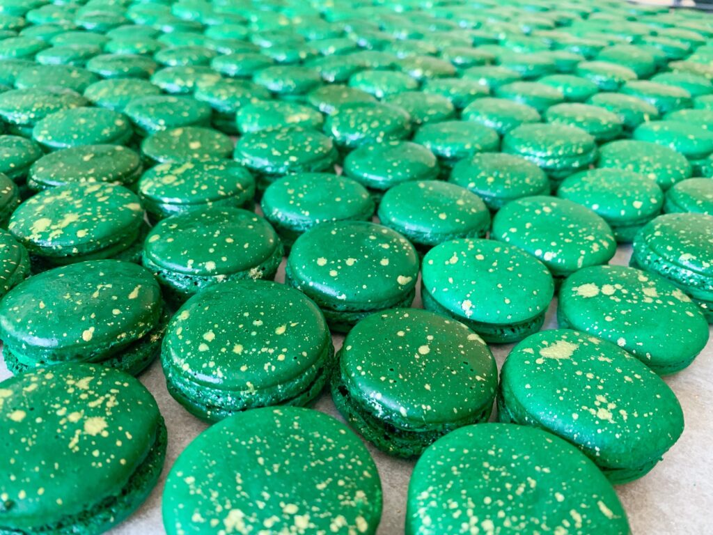 Dark Green Macarons Vibrant Color Shells Gold Splash Dots