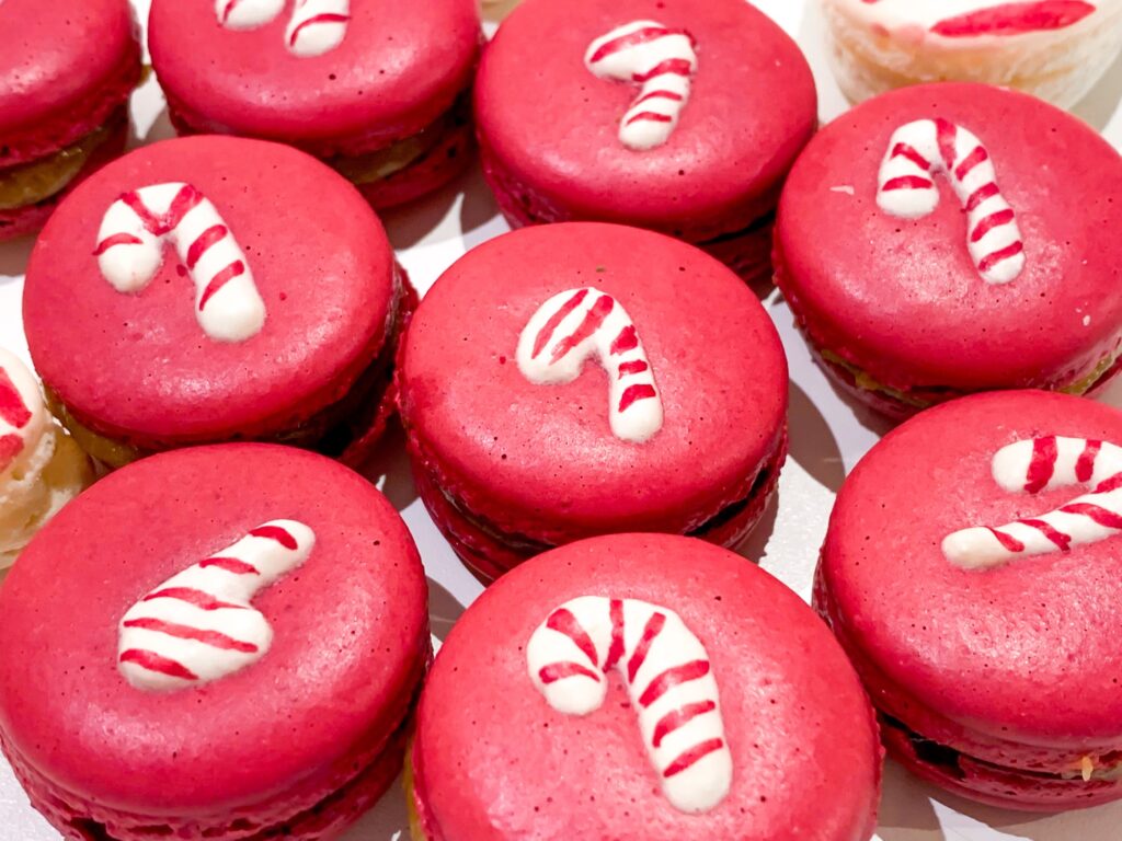Red Candy Cane Christmas Macarons Shells with salted caramel filling