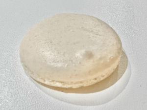 The failed beige bumpy macaron shell
