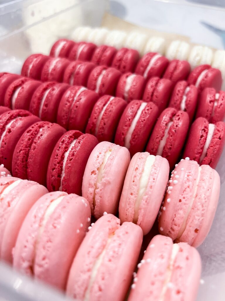 Pink, light pink and white macarons